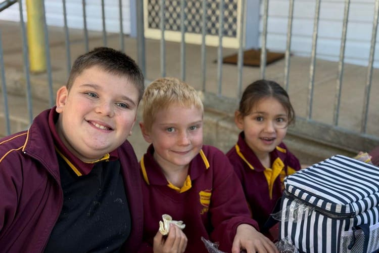 Three students eating lunch together