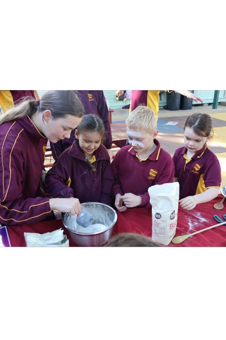 Wamoon students making Johnny cakes for NAIDOC week celebrations